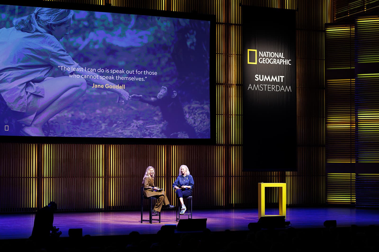 A wide view of Sophie Darlington and Alice Aedy in conversation on the National Geographic Summit stage in Amsterdam