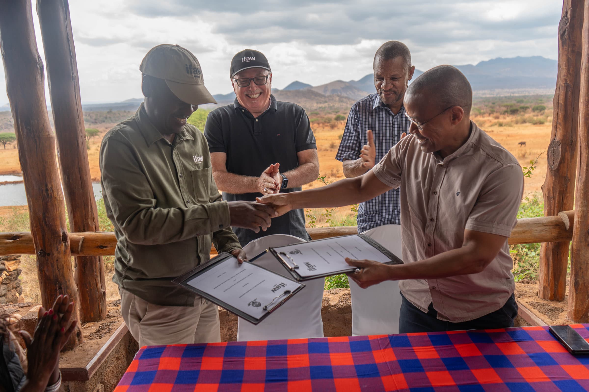 Azzedine Downes, with colleagues at IFAW in East Africa signing an MoU with the Governor of Taita Taveta County, H.E. Andrew Mwadime to advance community conservation in the Tsavo Conservation Area, and safeguard connectivity of habitats in the Southern Rangelands. ©IFAW