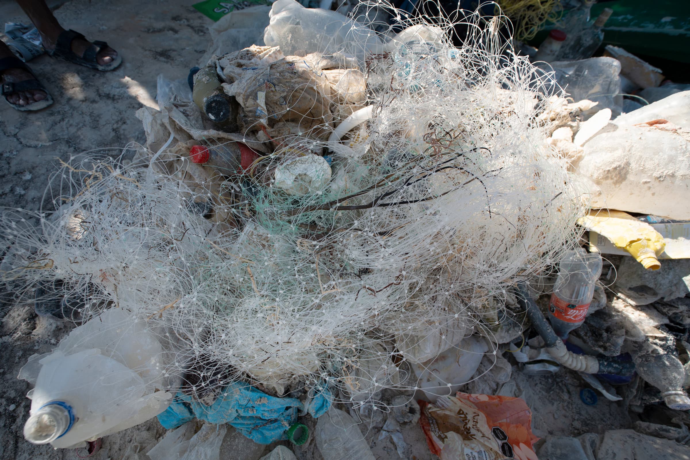The volunteer cleanup brigades have recovered waste such as plastic bags and bottles, ghost fishing nets, and more.