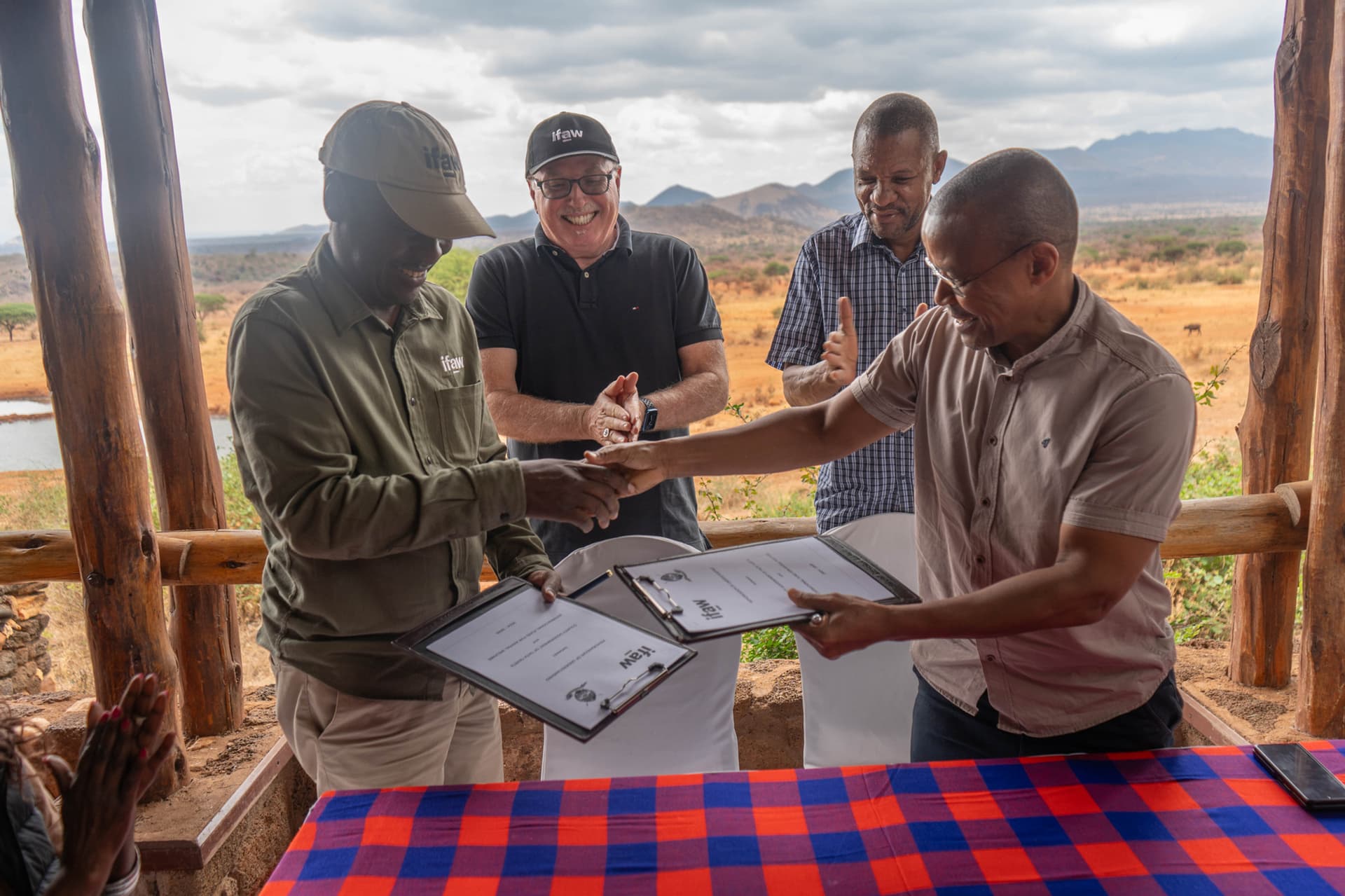 Azzedine Downes, with colleagues at IFAW in East Africa signing an MoU with the Governor of Taita Taveta County, H.E. Andrew Mwadime to advance community conservation in the Tsavo Conservation Area, and safeguard connectivity of habitats in the Southern Rangelands. ©IFAW